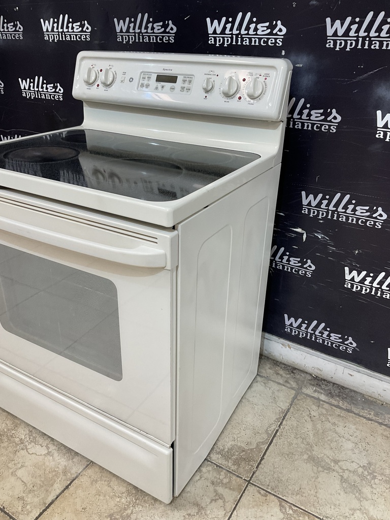 Ge Used Electric Stove 220volts (40/50 AMP) 30inches {3 prong} (Bisque ) 