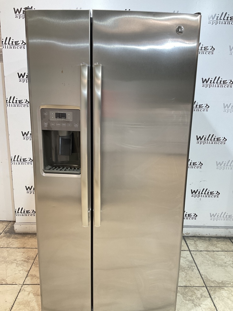 Ge Used Refrigerator Side by Side 33x69 1/2”