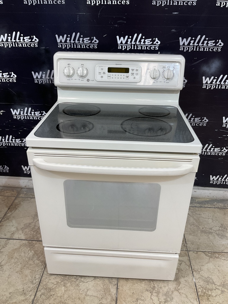 Ge Used Electric Stove 220volts(40/50 AMP) 30inches {3 prong} (Bisque) 
