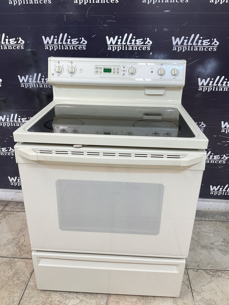 Ge Used Electric Stove 220volts (40/50 AMP) 30inches {4 prong} (Bisque) 