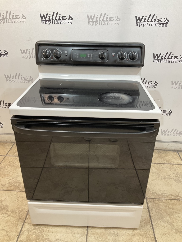 Ge Used Electric Stove 220volts (40/50 AMP) 30inches {4 prong} (White/Black) 