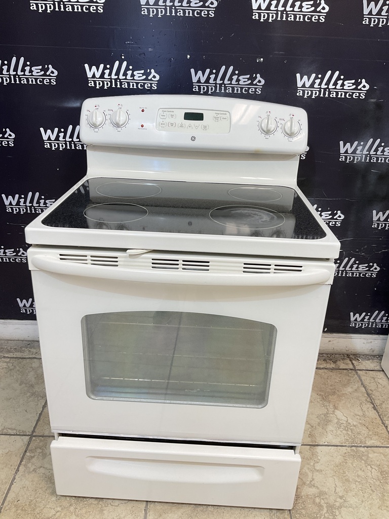 Ge Used Electric Stove 220volts (40/50 AMP) 30inches {4 prong} (Bisque) 