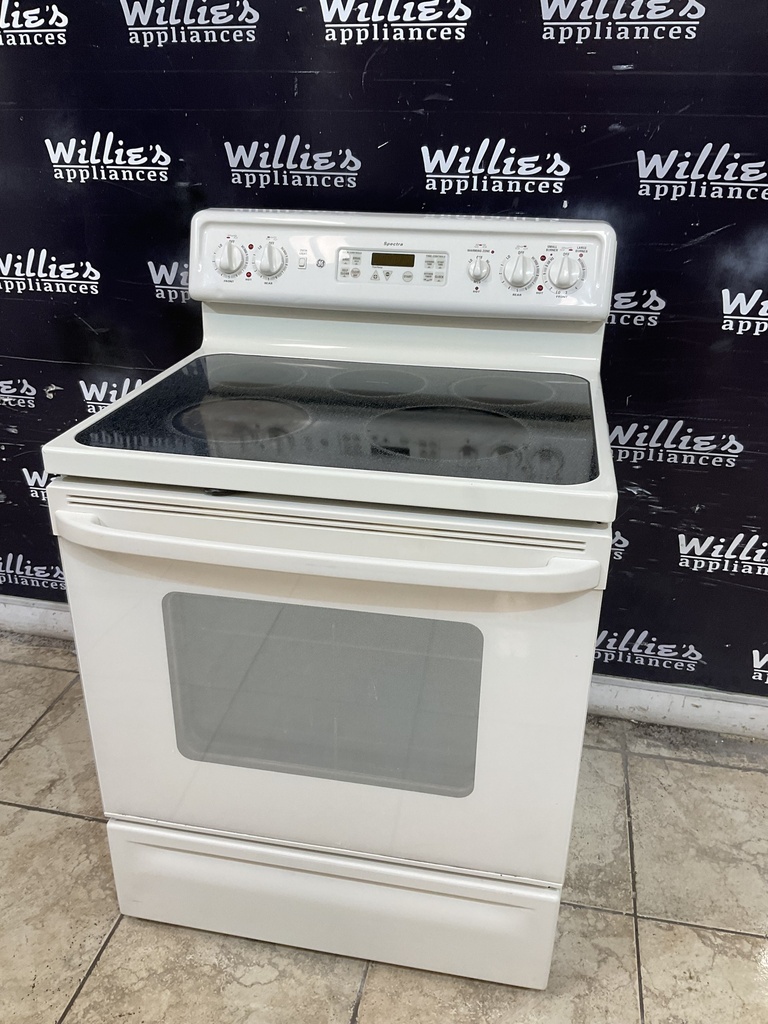 Ge Used Electric Stove 220volts (40/50 AMP) 30inches {3 prong} (Bisque ) 