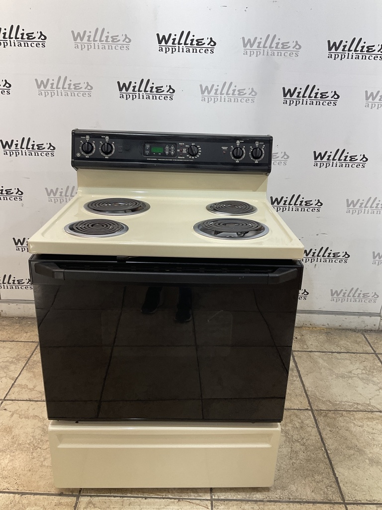 Ge Used Electric Stove 220volts (40/50 AMP) 30inches {no cord} (Bisque/Black) 