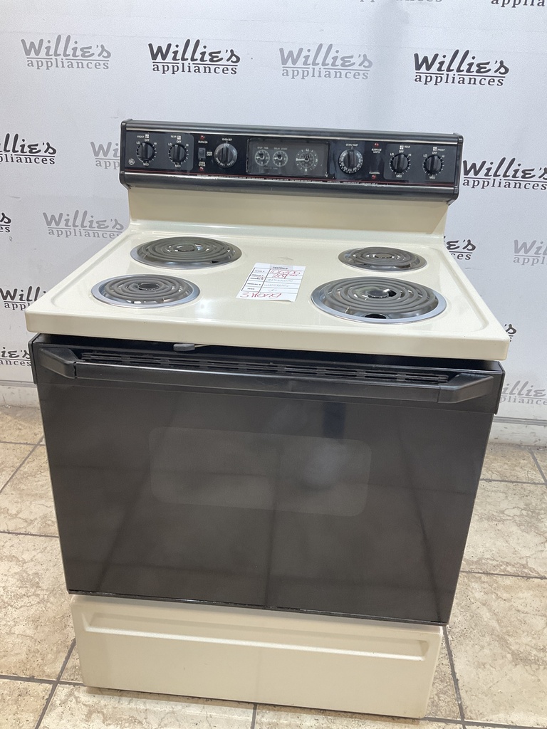 Ge Used Electric Stove 220volts (40/50 AMP)  30inches {3 prong} (Bisque/Black)