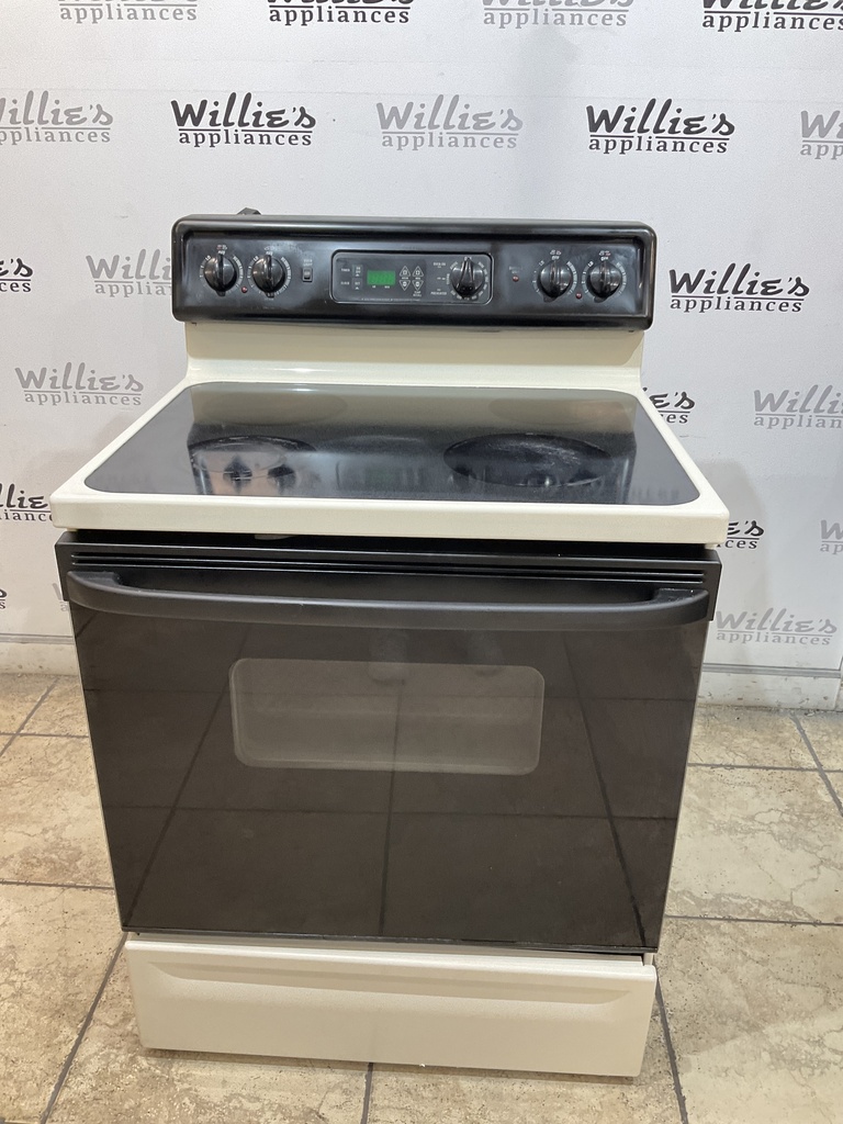 Ge Used Electric Stove 220volts (40/50 AMP) 30inches {3 prong} (Bisque/black) 