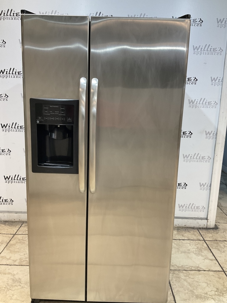 Ge Used Refrigerator Side by Side 33 1/2” x 67 1/2” (stainless steel) 