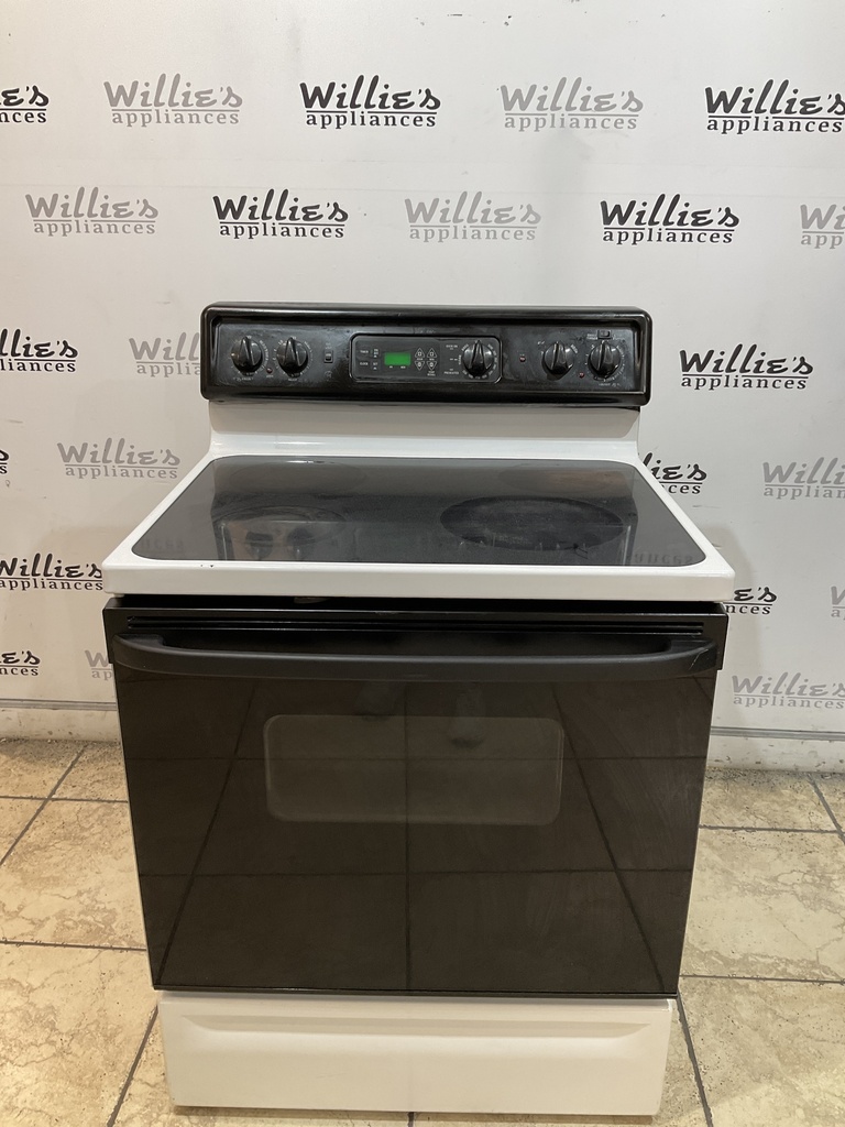 Ge Used Electric Stove 220volts (40/50 AMP) 30inches {3 prong} (White/Black) 
