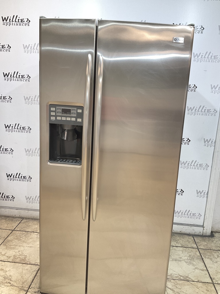Ge Used Refrigerator Side by Side 33 1/2” x 69 1/2” (Stainless Steel) 