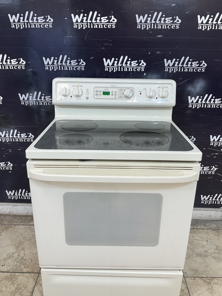 Ge Used Electric Stove 220 volts (40/50 AMP) 30inches {3 prong} (Bisque)