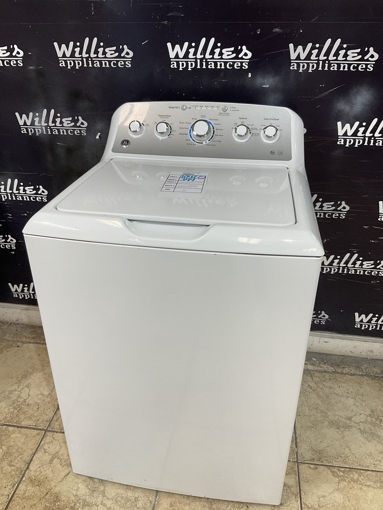 Ge Used Washer Top- load 27inches (white) 